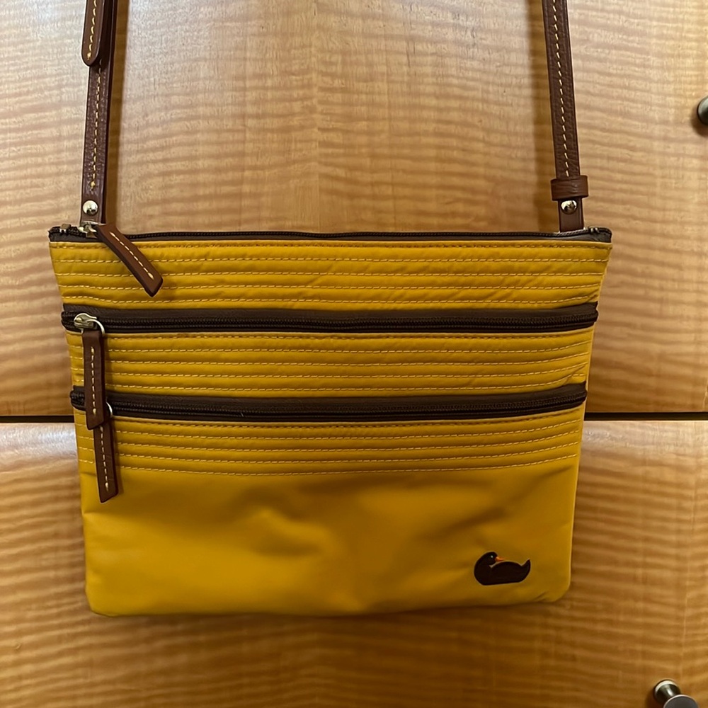 Dooney & Bourke crossbody triple-zip pouch bag